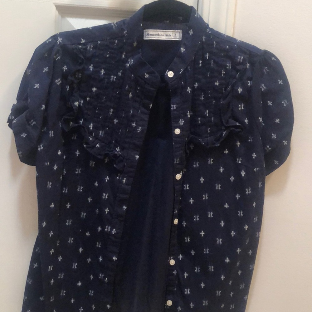 Blue top with white flowers